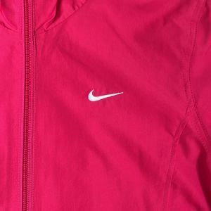 Nike windbreaker jacket bright raspberry red in color size Medium like new